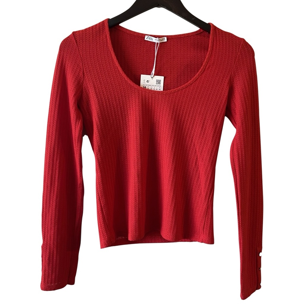 Zara long sleeved crop shirt with button detail.